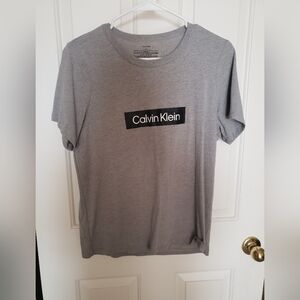 Women's Medium Calvin Klein Solid Gray shirts.